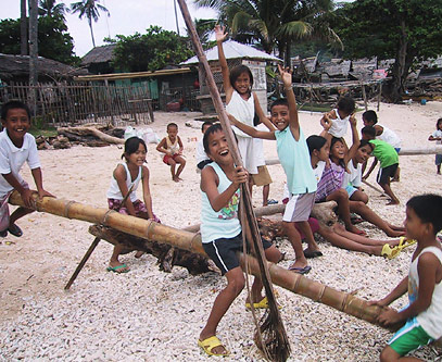 Apo Island children: their future no no teetering? 